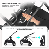 A one-handed folding mechanism for the stroller, showcasing the smooth operation and automatic wheel alignment to prevent pinched fingers.